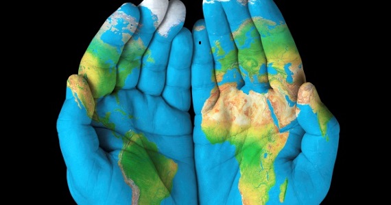 Hands.PaintedwithWORLDmap_570_x_300.jpg