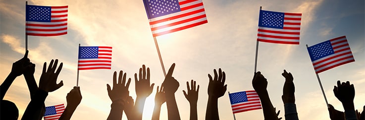 Silhouettes-of-People-Holding-the-Flag-of-USA