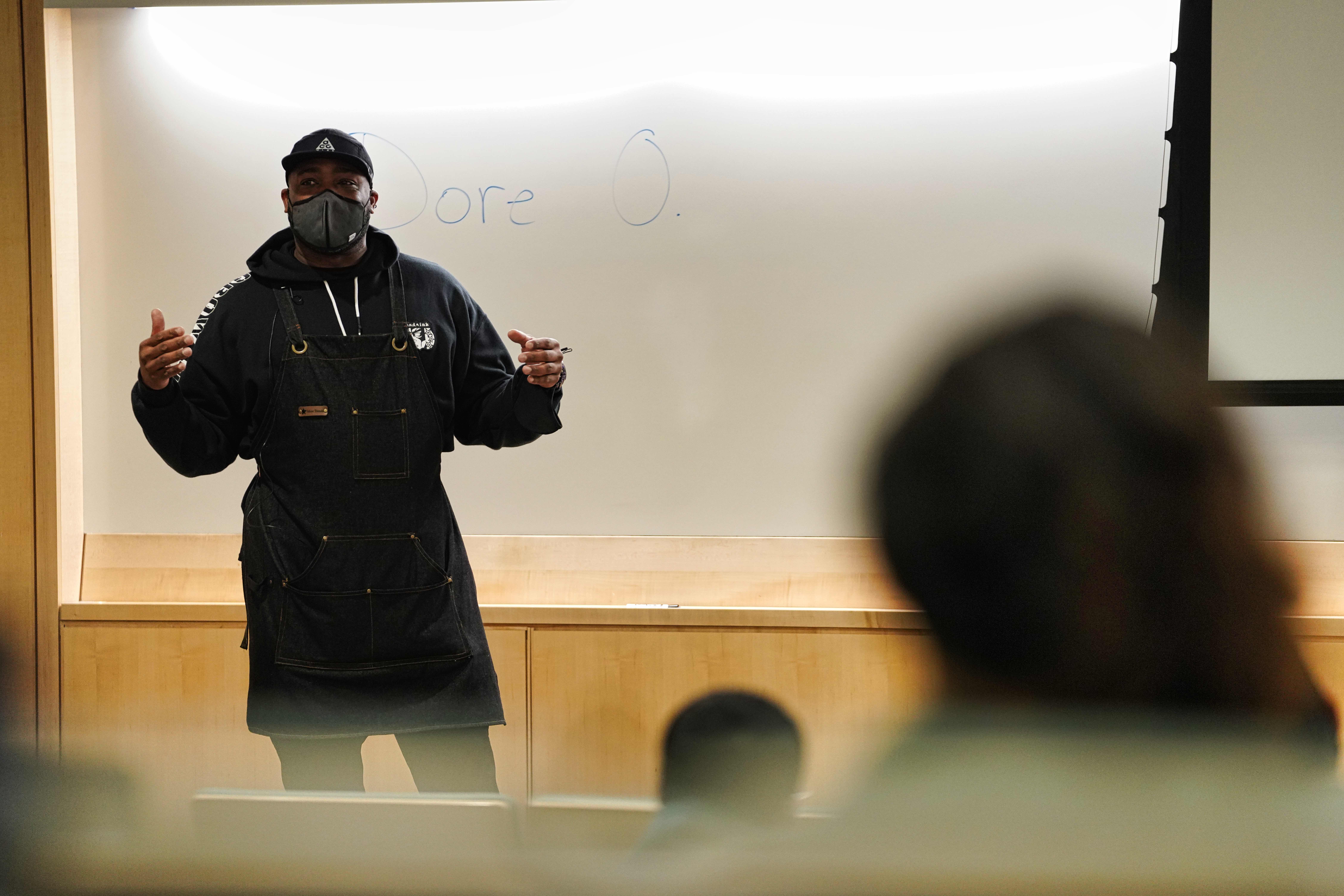 ProBlak speaks to a class.