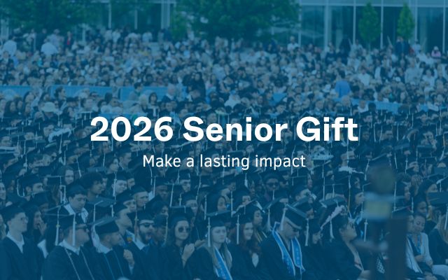 Image of Students at UMass Boston Graduation Image with text that reads 