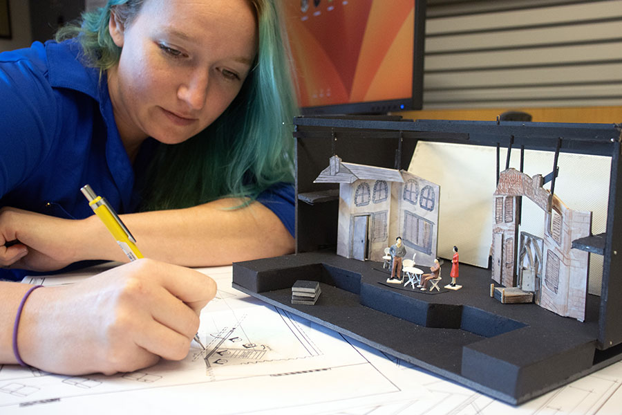 Professor works on set design for